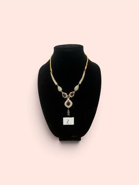 Gold-Tone Necklace with Deep Red Gemstone Pendant
